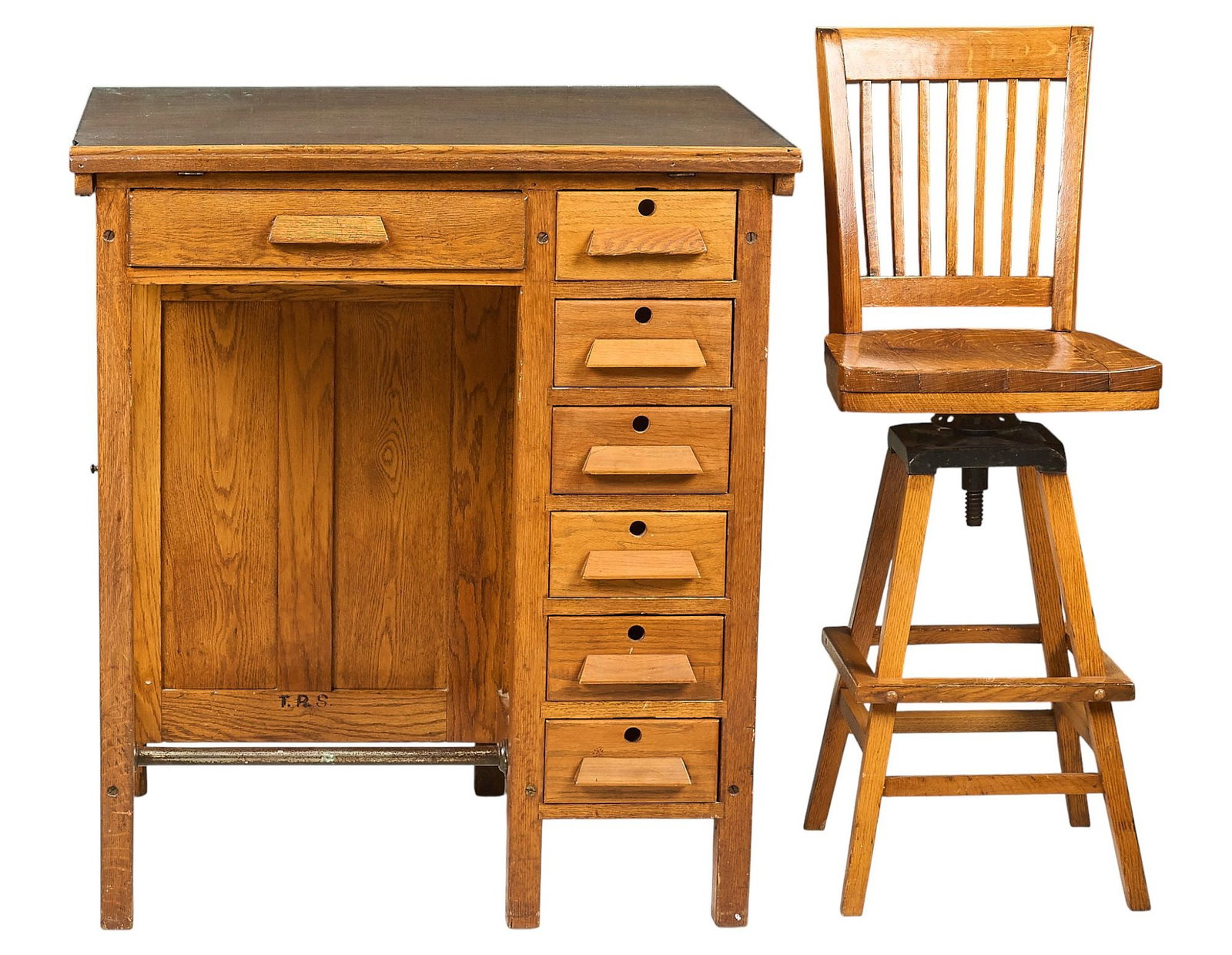Antique Oak Desk with Adjustable Chair: Antique oak desk raising top, seven drawers, lower side cabinet, and glass plate top, and adjustable height wooden chair, marked with initials "T.P.S." height 42 in. x width 36