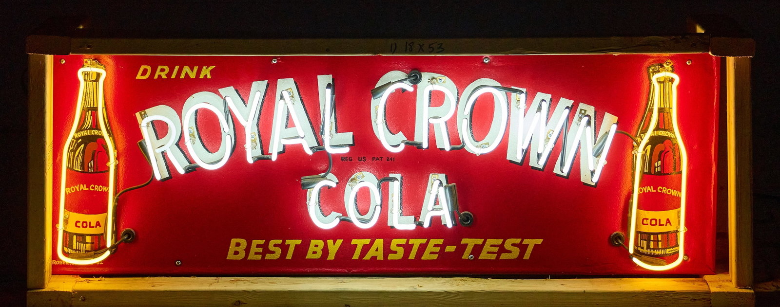 Royal Crown Cola Neon Sign: Royal Crown Cola neon sign, single-sided, in working condition, housed in custom shipping frame height 18 in. x width 54 in. x depth 6 in. Provenance: Property from a home in San Antonio,