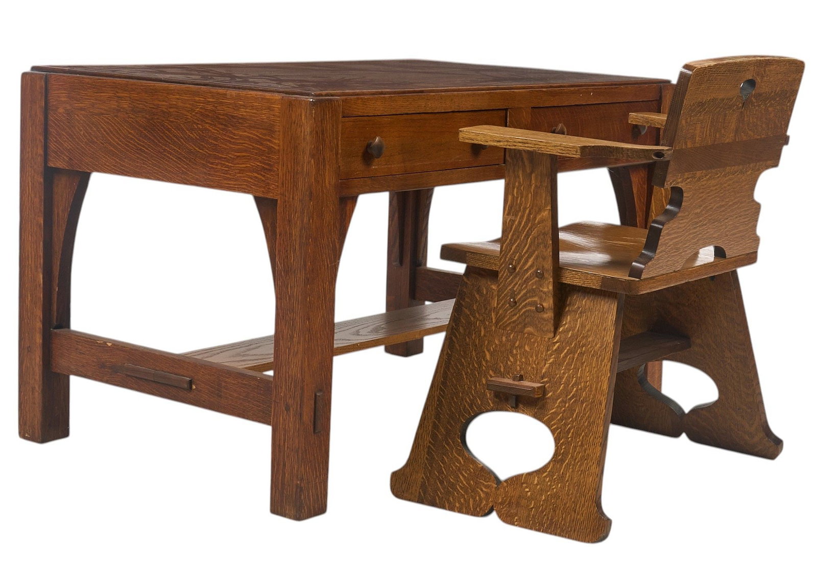 Arts & Crafts Oak Desk and Chair: Arts & Crafts style oak desk with two drawers, and lower shelf, and chair height 29 in. x width 48 in. x depth 30 in. / desk Provenance: Property from a home in San Antonio, Texas