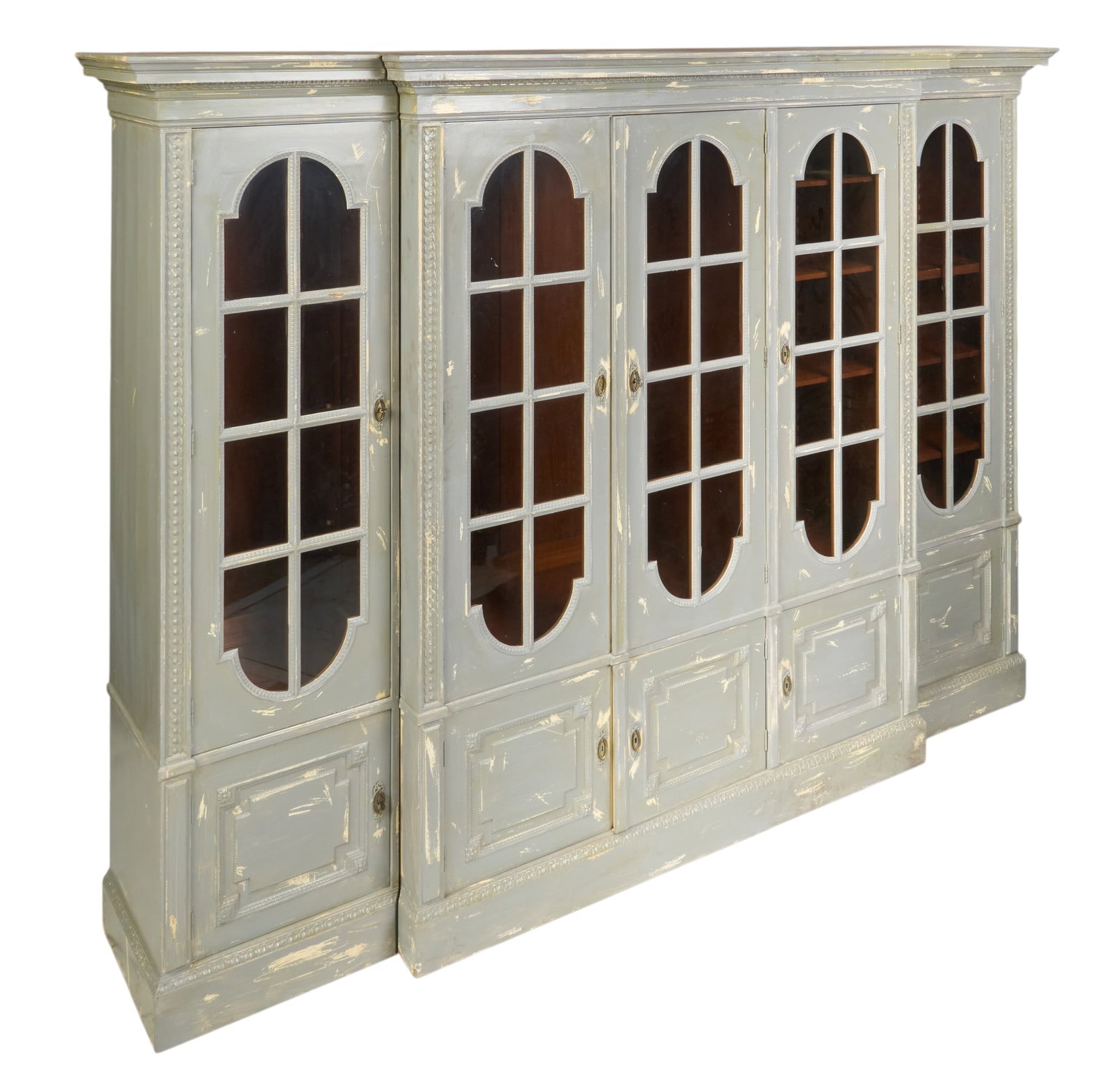 10 ft. Wide Breakfront China Cabinet: Monumental four-piece glass-front breakfront cabinet with adjustable shelving, composed of middle top section with three doors resting on bottom plinth with three doors, flanked by side cabinets