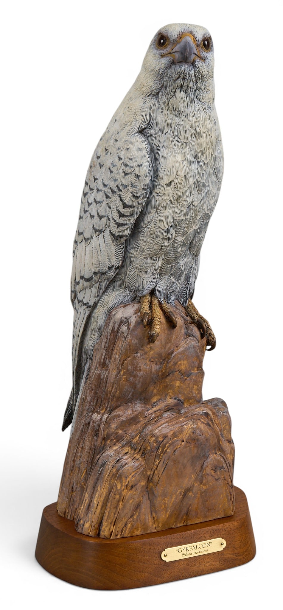 Glenn Swanson, "Gyrfalcon": Glenn Swanson (Amer., b. 1951), "Gyrfalcon", hand carved and painted wooden sculpture atop wooden base, incised signature height 21 in. x width 9 in. x depth 8.5 in. (including base) Provena