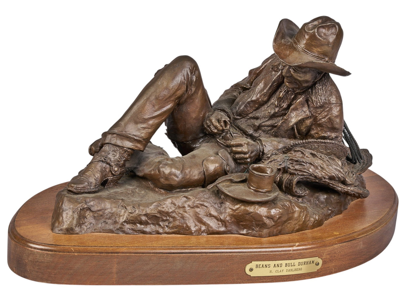 H. Clay Dahlberg, "Beans & Bull Durham" *mmm: H. Clay Dahlberg (Texas, b. 1946), "Beans & Bull Durham", artist-cast bronze sculpture on wooden base, with incised signature, edition number 3/15, and date, 1979 height 10.5 in. x 