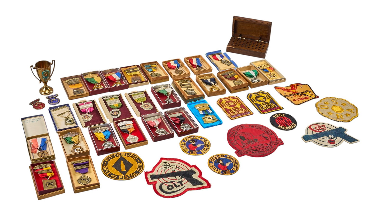 Collection of NRA Collectibles: Collection of NRA, Rifle, and Pistol association patches, collectibles, medals, etc. length 4 in. x width 3 in. Provenance: Property from a home in San Antonio, Texas 
