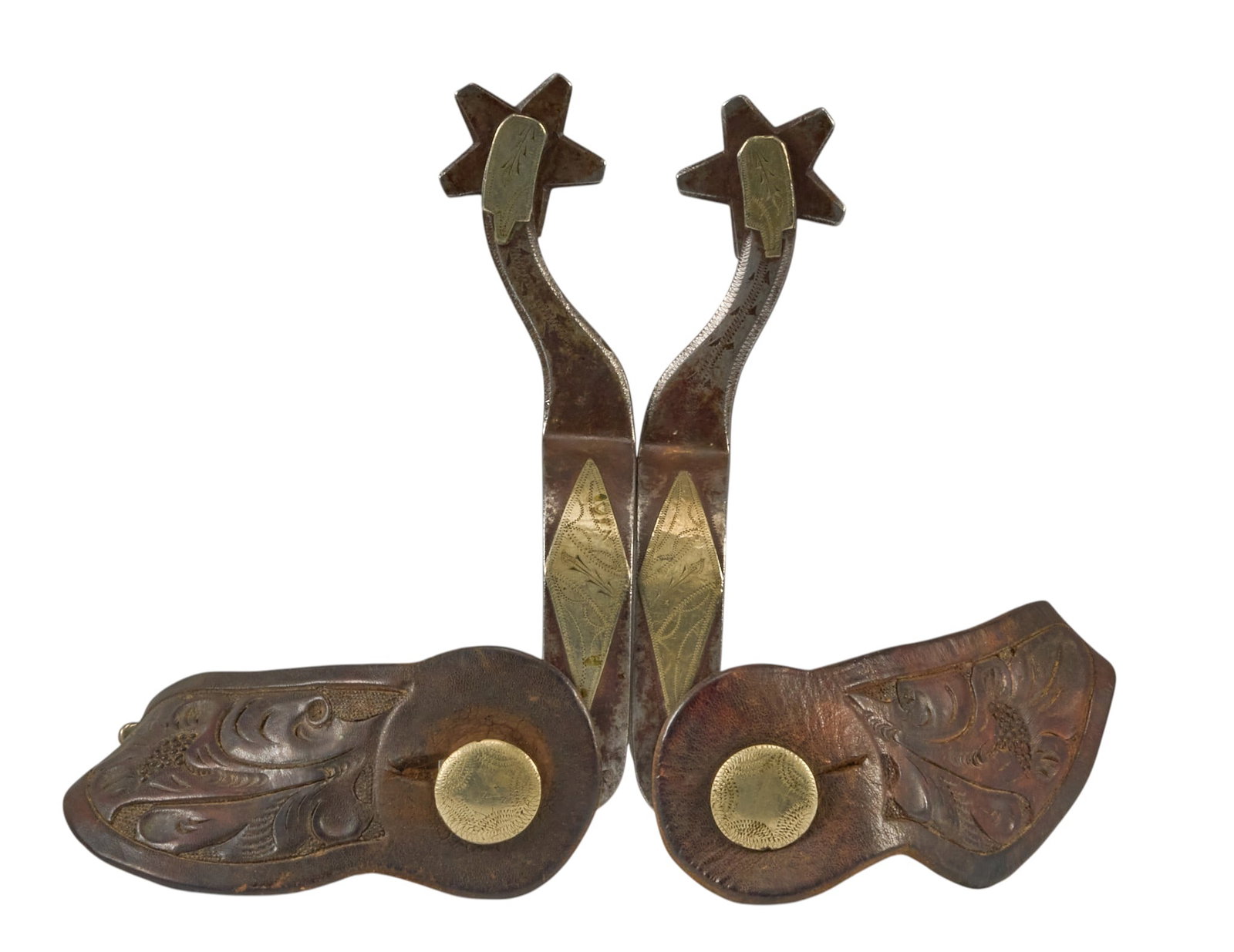Pair of August Buermann Marked Texas Style Spurs: August Buermann marked Texas style spurs, with silver overlay, tooled leather heel straps, marked "Hand Forged Steel", "Star AB", circa 1920's overall length: 7 in. heel