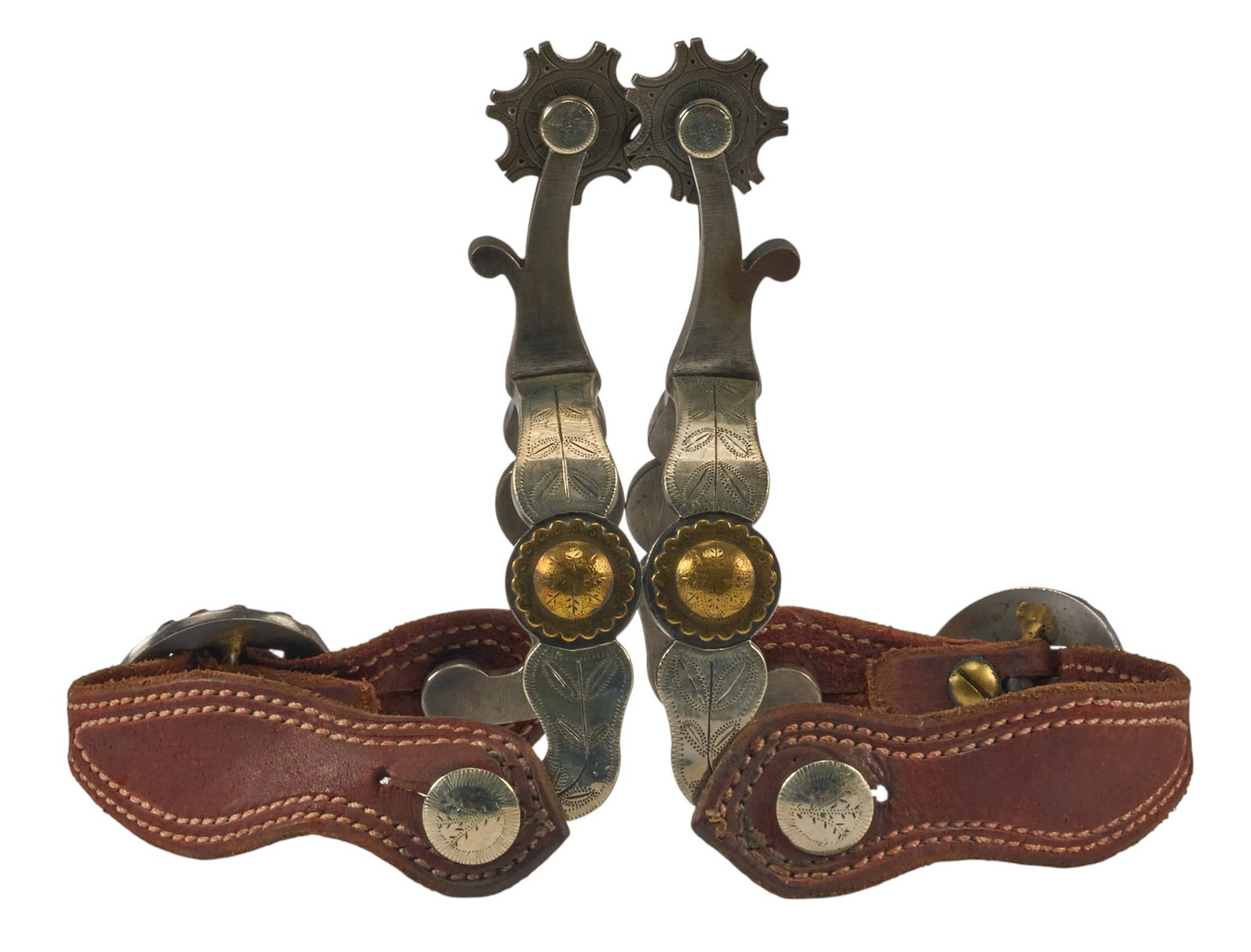 Pair of Don Pierce McChesney Pattern Spurs: Pair of Don Pierce McChesney pattern spurs, with brass and silver mounts, maker marked overall length: 6.5 in. heel width: 3.5 in. rowel diameter: 1.5 in. 