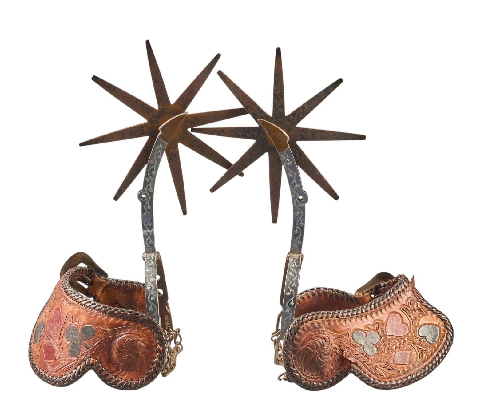 Pair of Vintage Gal-Leg Card Suite Spurs: Pair of vintage gal-leg spurs, with tooled leather straps featuring card suite design, large rowels, and engraved shanks overall length: 10.5 in. heel width: 3.5 in. rowel diameter: 6