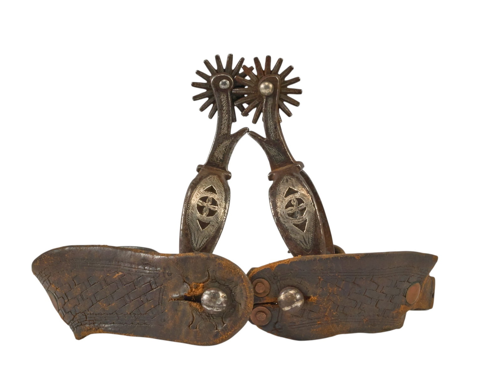 Pair of Vintage California Filigreed Spurs: Pair of vintage California filigreed spurs, cowgirl sized, with tooled leather heel strap, unmarked overall length: 5.5 in. heel width: 3 in rowel diameter: 1.5 in. Provenance: Property fr