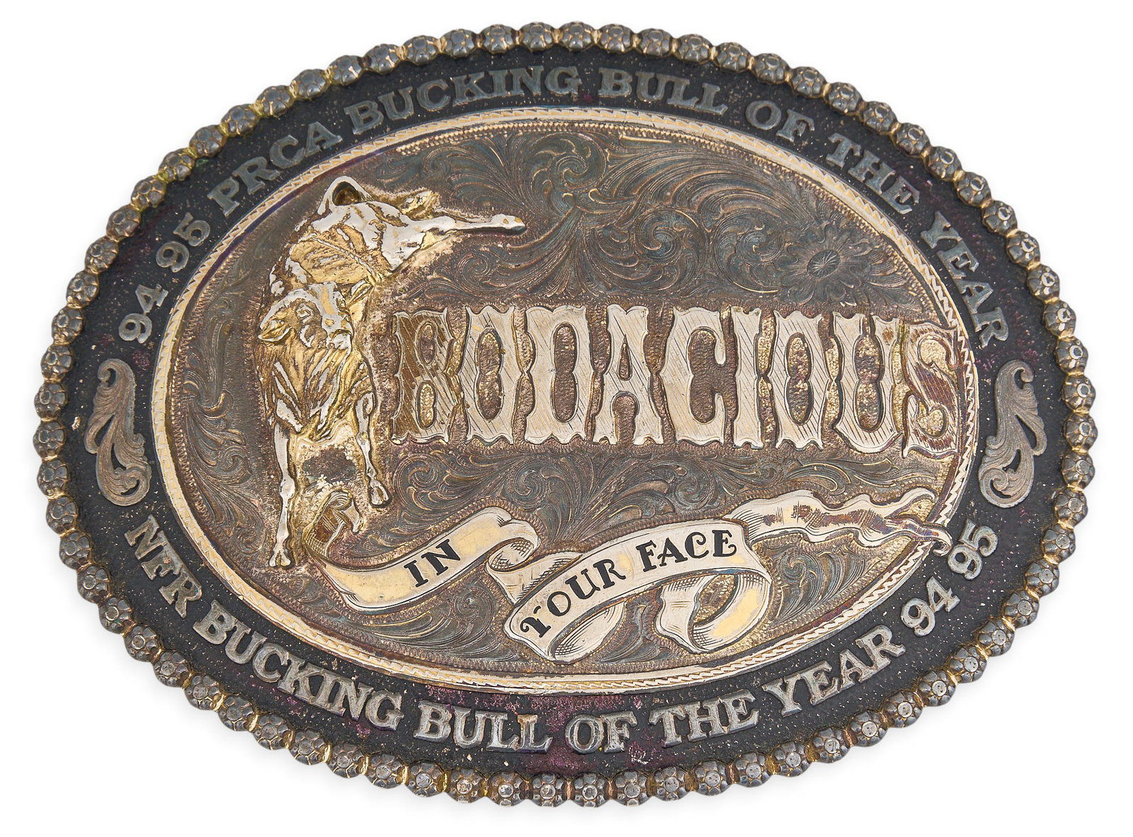 Montana Silversmiths 94/95 PRCA Bucking Bull of the Year Belt Buckle: Montana Silversmiths 94/95 PRCA Bucking Bull of the Year belt buckle length 4 in. x width 5 in. Provenance: Property from a San Antonio, Texas collector of vintage and antique Western items