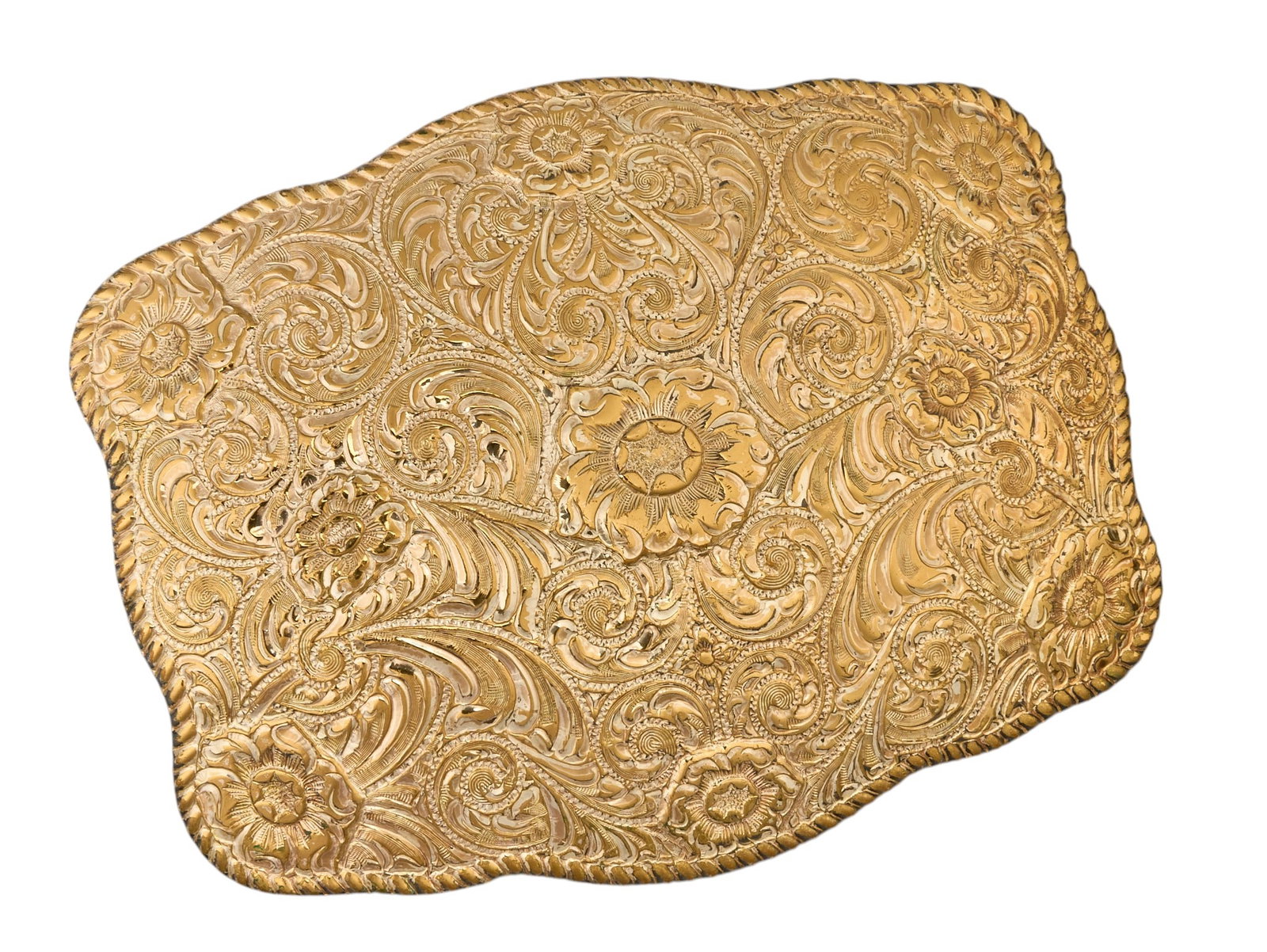 Crumrine Engraved Belt Buckle: Crumrine engraved belt buckle with floral motifs length 5 in. x width 6 in, Provenance: Property from a San Antonio, Texas collector of vintage and antique Western items