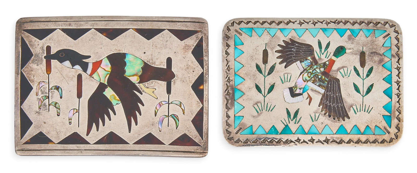 (2) Zuni Multi-Stone Inlay Duck Buckles: Two Zuni sterling silver buckles, each set with multi-stone inlay depicting duck motifs, featuring mother of pearl, abalone, shell, turquoise, coral, and onyx, with stamped details throughout, both