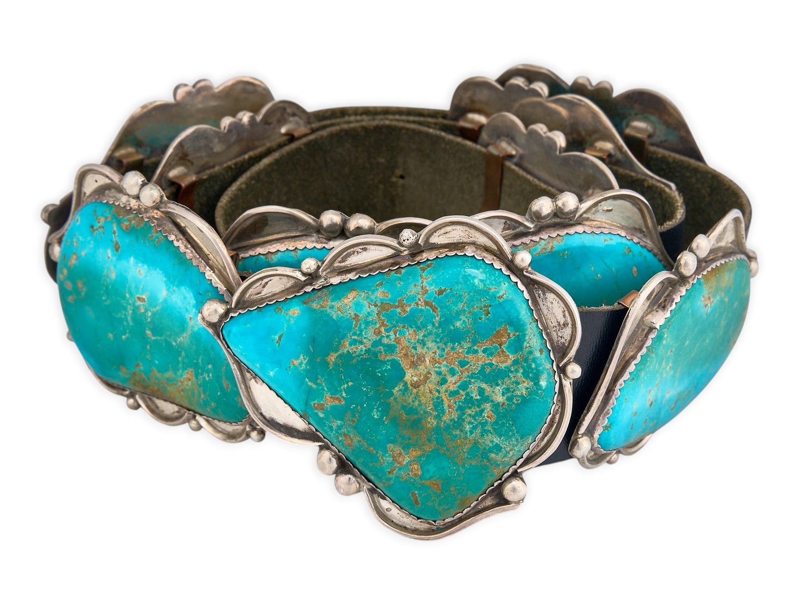Substantial Sterling Silver & Turquoise Concho Belt: Rey Fierro, substantial sterling silver concho belt featuring nine conchos and buckle on a black leather belt, set with large turquoise cabochons, buckle signed "R", possibly Pilot Mountain