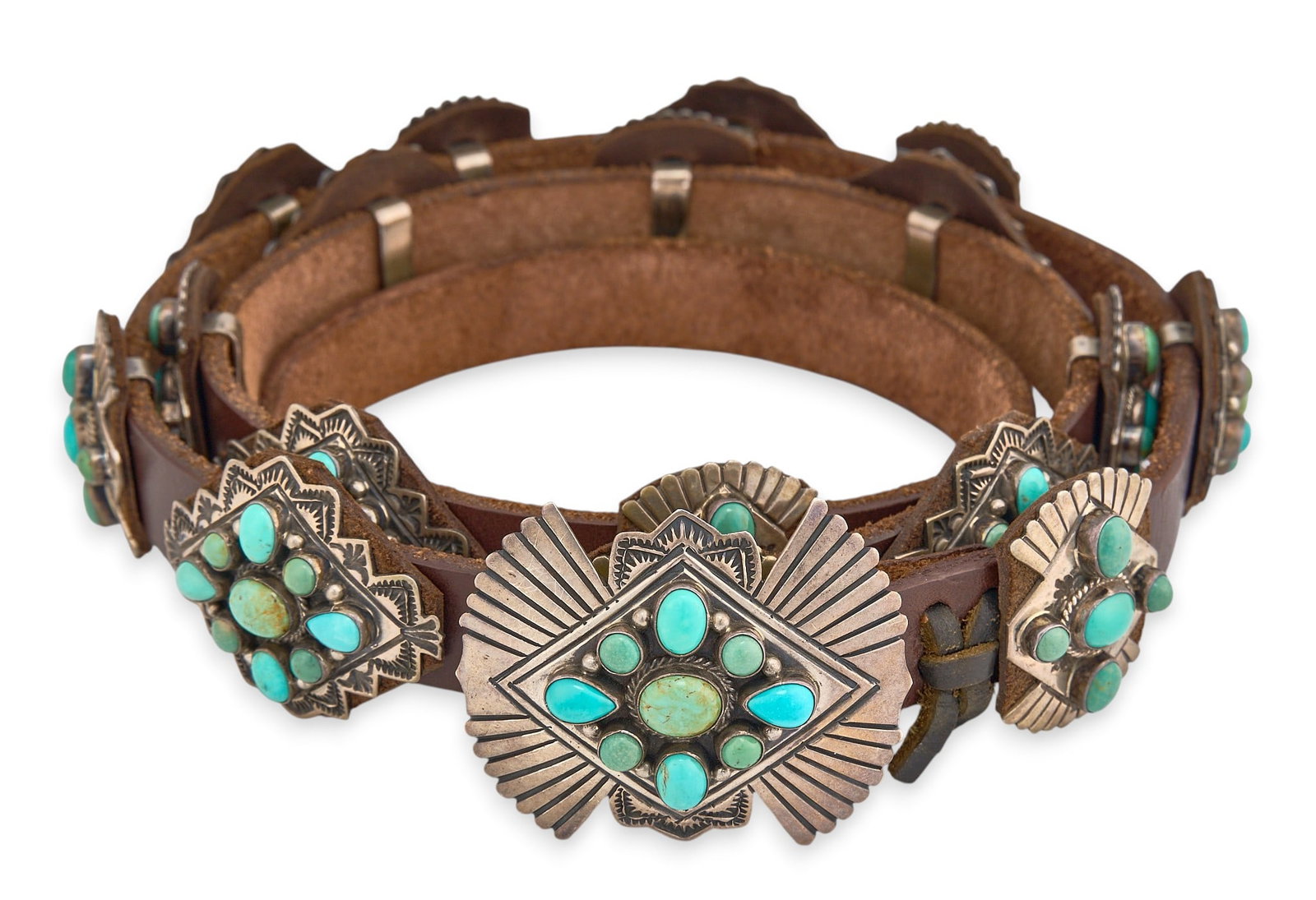 Andy Cadman, Sterling & Turquoise Concho Belt: Andy Cadman, Navajo sterling silver concho belt, featuring seventeen conchos and buckle on brown leather belt, set with turquoise cabochons and stamped details, buckle marked "A. Cadman
