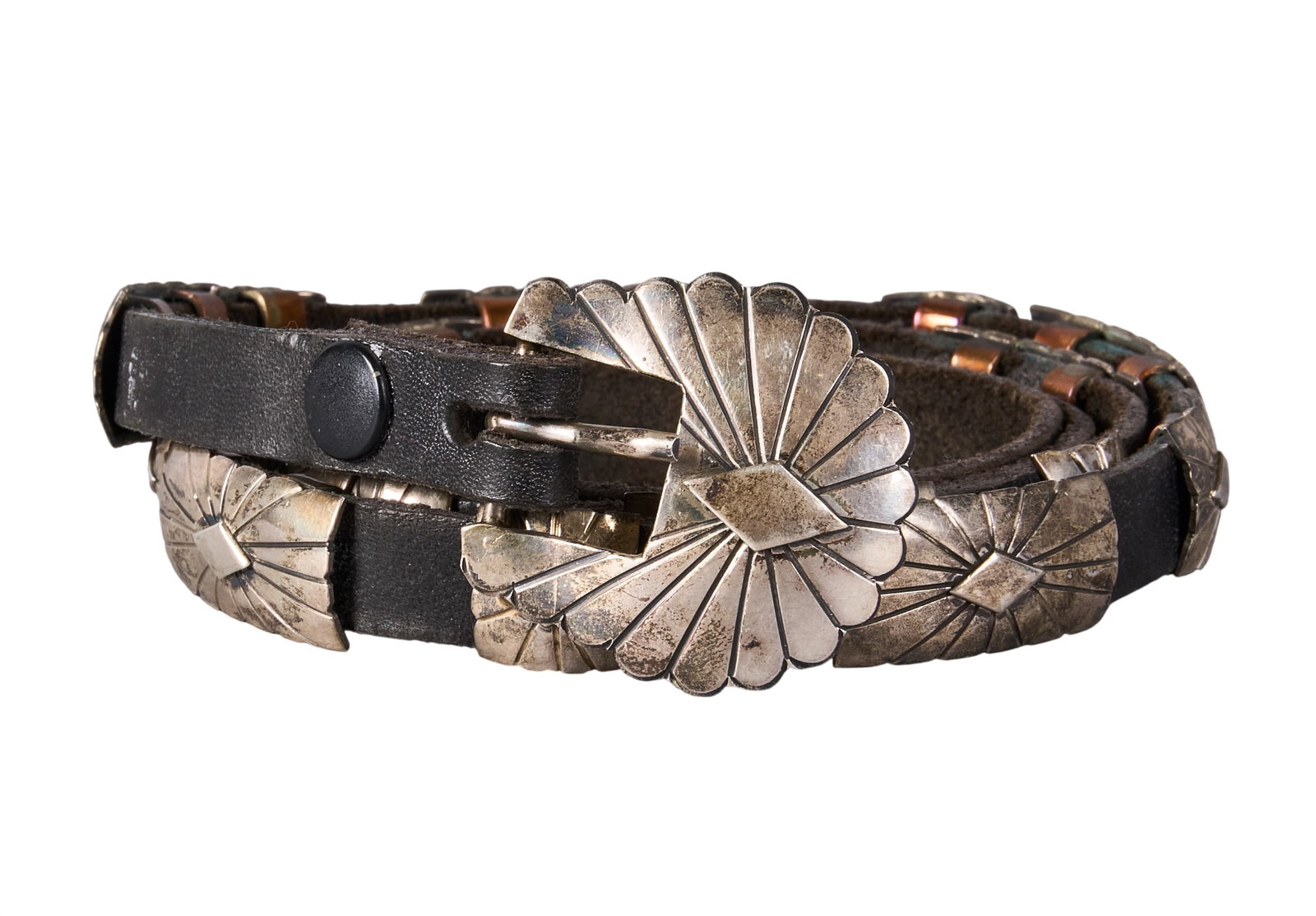 Vintage Petite Sterling Silver Concho Belt: Vintage petite Southwestern style sterling silver concho belt, featuring eighteen conchos and buckle on black leather belt, buckle marked "Sterling D" Length: 39 in. Total weight: 101.6 g
