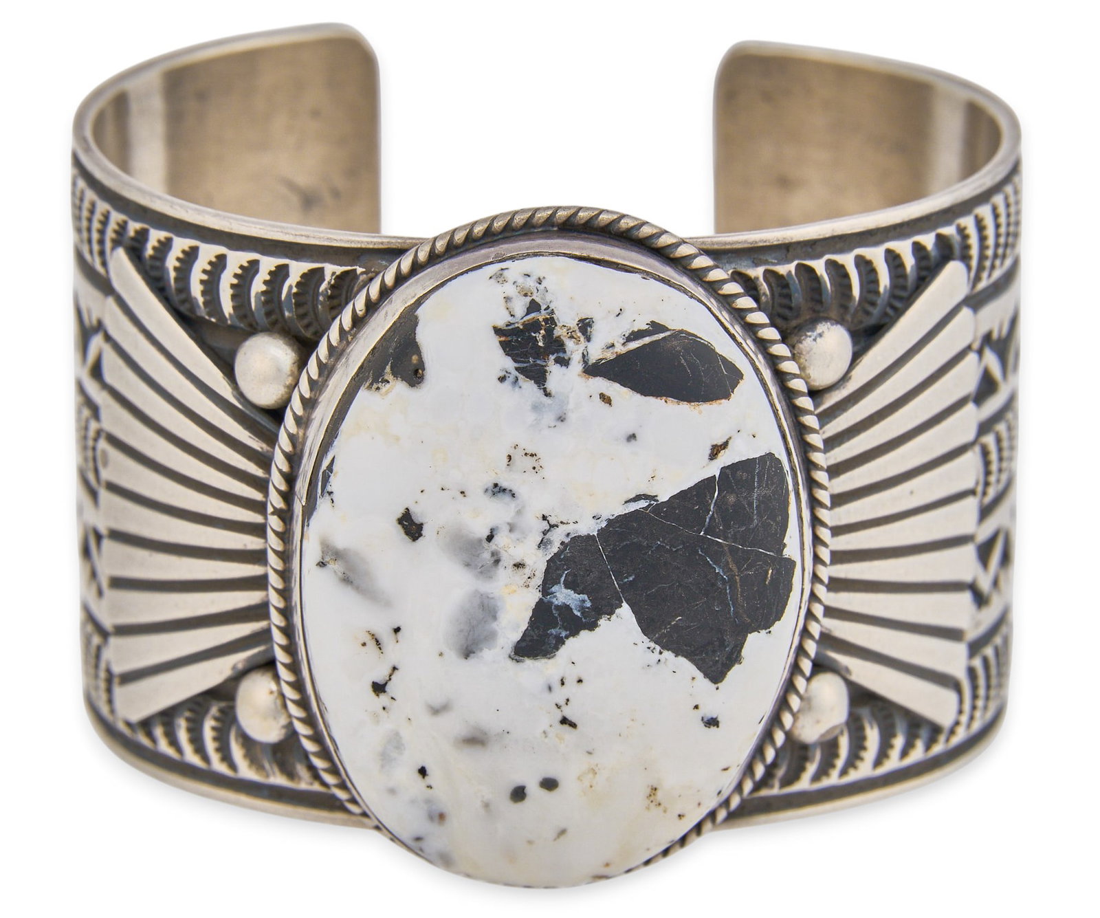 Albert Jake, Navajo Sterling & White Buffalo Cuff: Albert Jake, Navajo sterling silver cuff bracelet set with white buffalo cabochon and twisted wire motif, featuring hand-stamped details throughout, marked "A JAKE Sterling" Circumference: