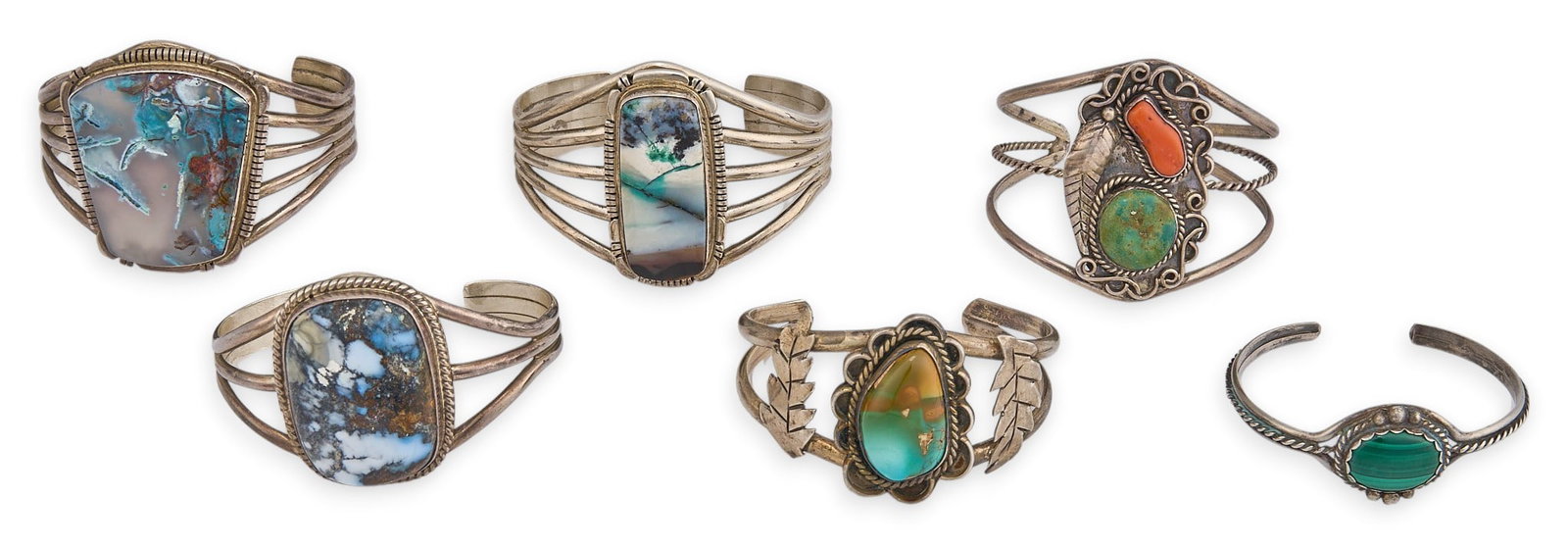 (6) Southwestern Cuffs: Six Southwestern sterling silver cuffs, each set with hardstone cabochons, featuring twisted wire motifs and stamped details, most marked Circumference: 6.5 in. / largest Total weight: 207.0