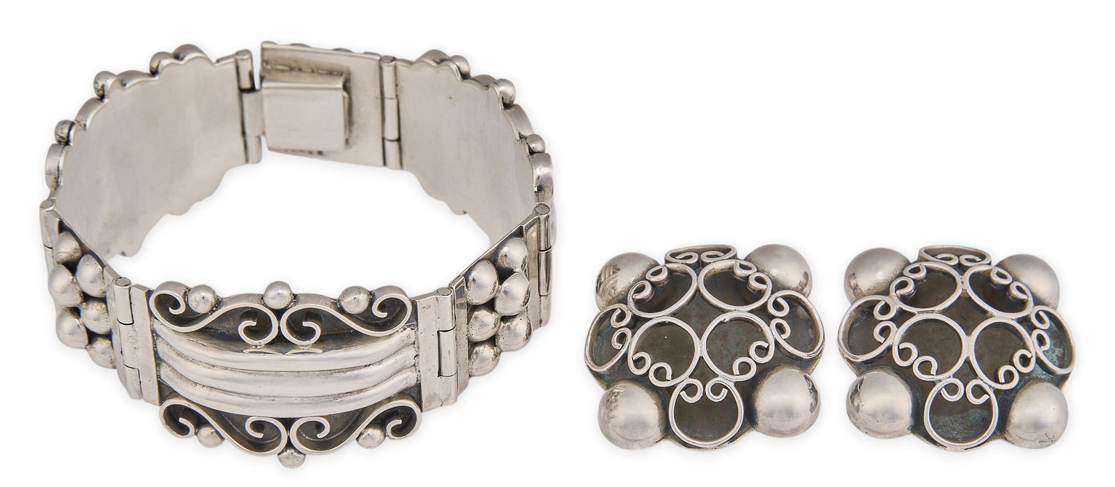 Mexican Sterling Bracelet and Earring Set: Vintage Mexican sterling silver jewelry suite featuring a hinged bracelet and a pair of matching clip-on earrings in an openwork scroll and silver bead design, bracelet marked "Mexico Sterling 92