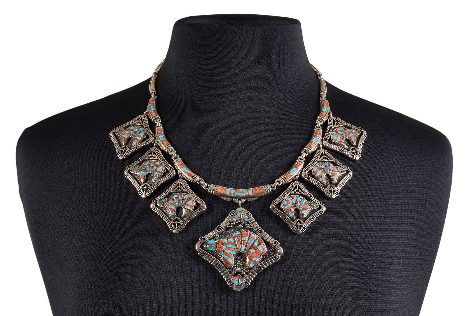 Southwest Style Sterling & Multi-Stone Bear Necklace: Southwest style sterling silver necklace set with multi-stone inlay in bear motif, featuring spiny oyster and opal inlay with stamped details throughout, hook and eye closure, marked "Sterling&qu