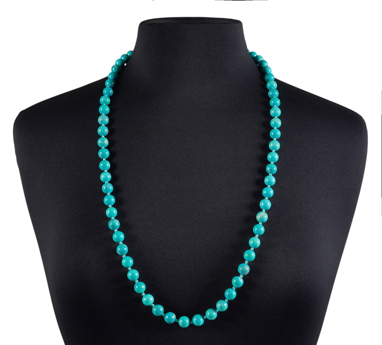 Beaded Turquoise Necklace: Single-strand beaded turquoise necklace Length: 32 in. Total weight: 104.5 g Provenance: Property from a home in the Alamo Heights neighborhood of San Antonio, Texas