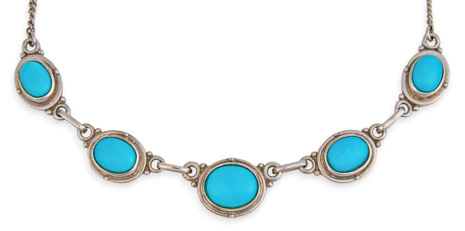 Sterling Silver Turquoise Necklace: Sterling silver station necklace set with five turquoise cabochons, clasp marked "925" Length: 18 in. Total weight: 0.485 ozt Provenance: Property from a home in the Alamo Heights neighborho