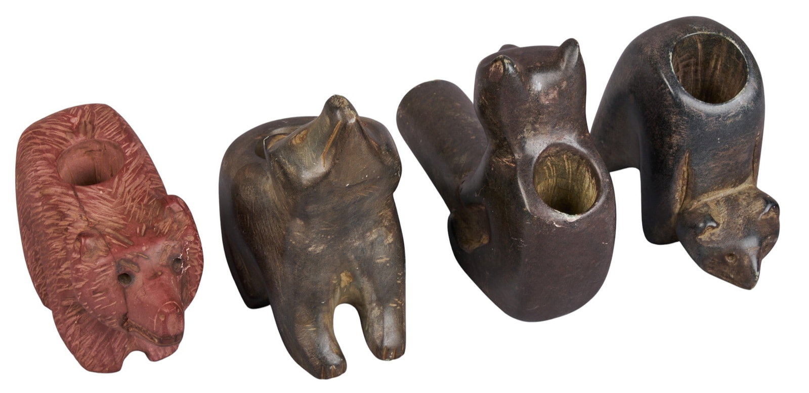 Collection of (4) Native American Bear Pipes: Collection of four Native American bear pipes, hand-carved soapstone height 3.5 in. x width 1.25 in. x depth 4.5 in. / largest Provenance: Property from a home in Boerne, Texas 