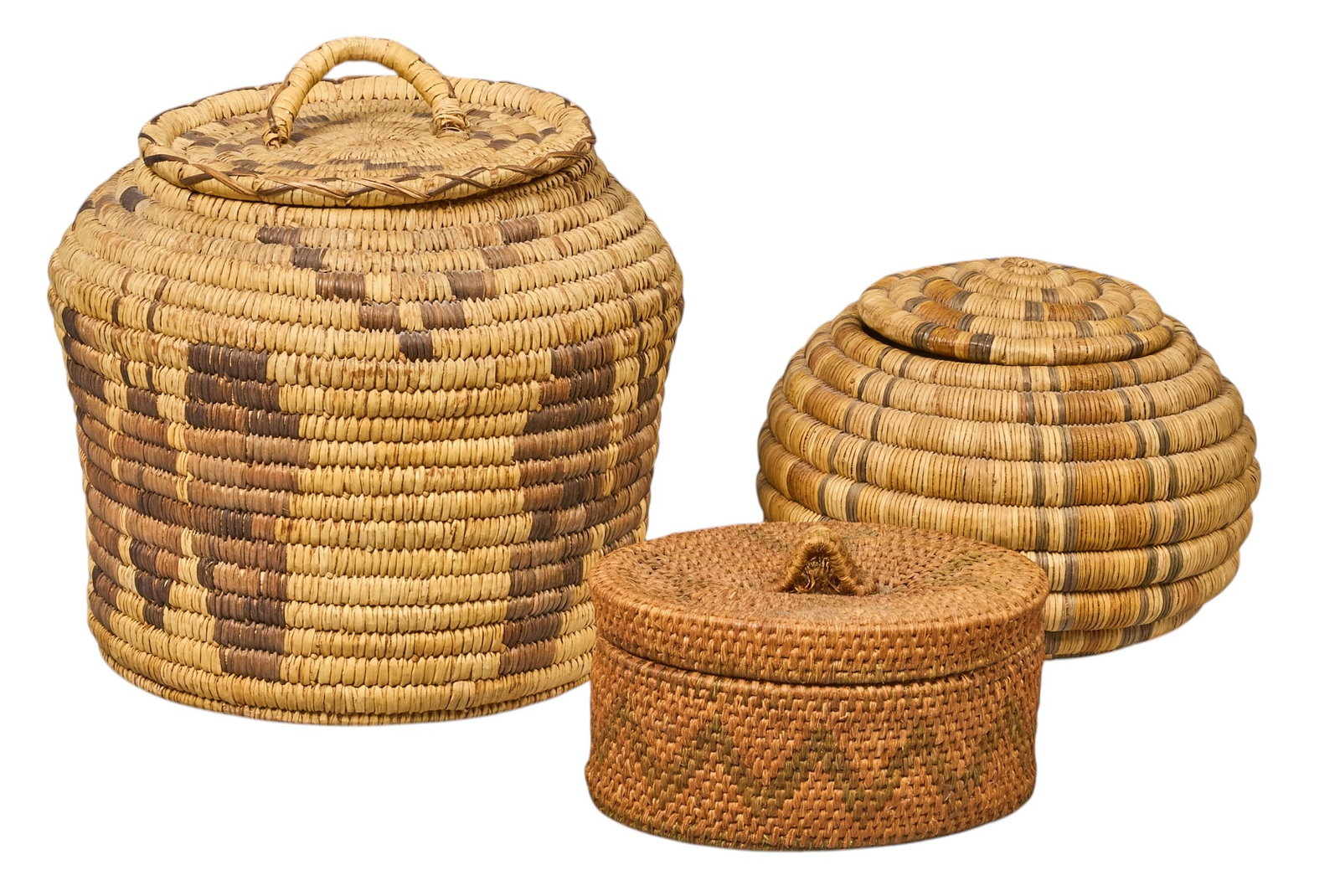 Collection of (3) Handwoven Native American Lidded Vessels: Collection of three handwoven Native American lidded vessels height 8.5 in. x diameter 10 in. / largest Provenance: Property from a home in San Antonio, Texas