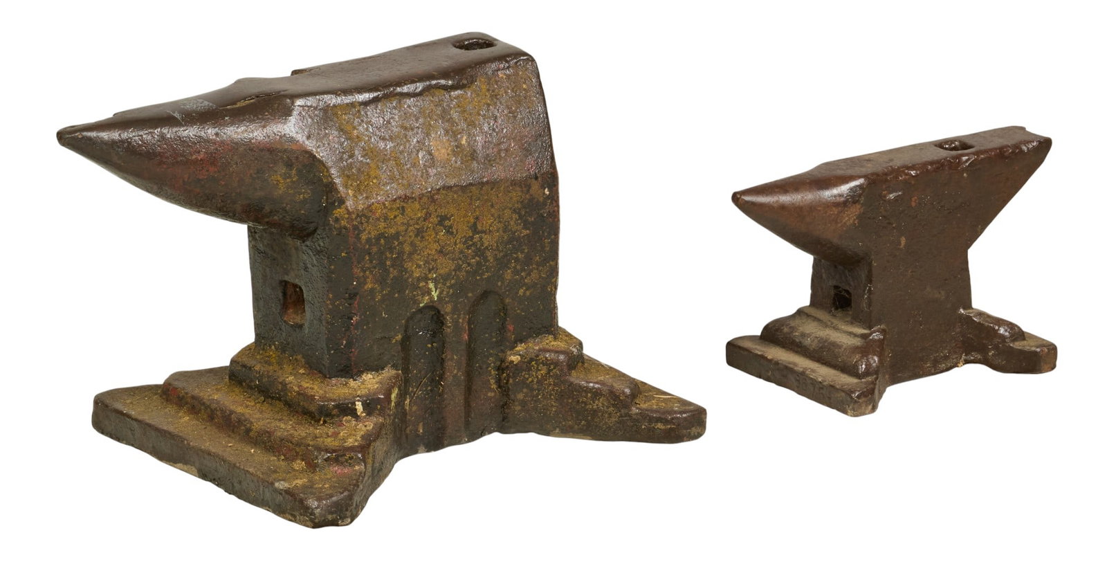 (2) Iron Anvils: Two iron anvils height 13 in. x width 16 in. x depth 14 in. / largest 215 lbs / largest 46 lbs / smallest