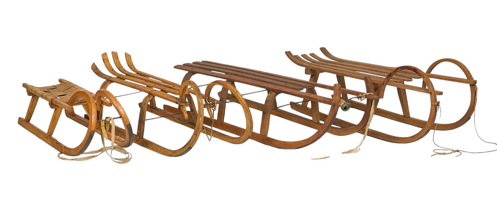 (4) Vintage Sleds: Collection of wooden sleds with iron hardware and rope details height 16 in. x width 56 in. x depth 17 in. / largest