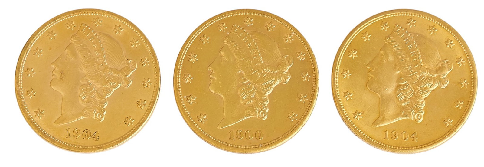 (3) $20 Liberty Head Double Eagle Gold Coins: Three $20 Liberty Head Double Eagle gold coins, to include, 1900 Liberty Head Double Eagle, and two 1904 Liberty Head Double Eagle coins Provenance: Property from the Estate of Joy Speck Wilson (1942-