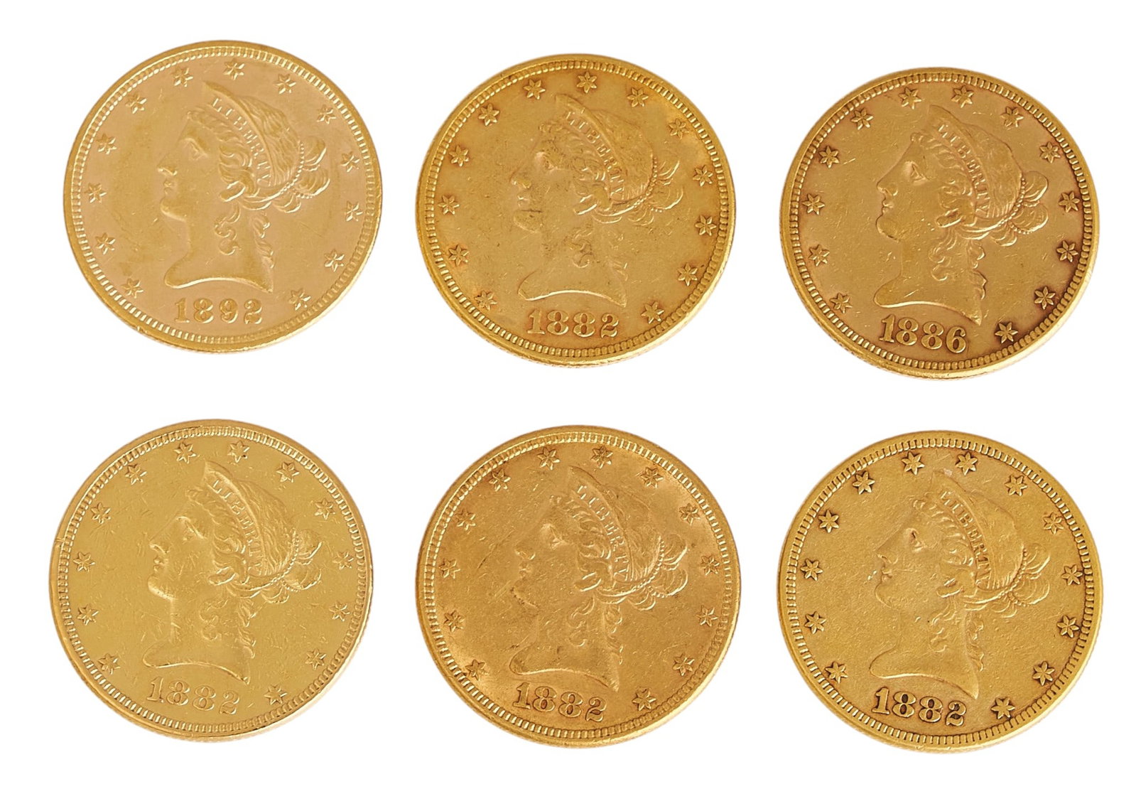 (6) $10 Liberty Head Eagle Gold Coins: Six $10 Liberty Head Eagle coins, to include four 1882 Liberty Head Eagles, one 1886 Liberty Head Eagle, and one 1892 Liberty Head Eagle Provenance: Property from the Estate of Joy Speck Wilson (