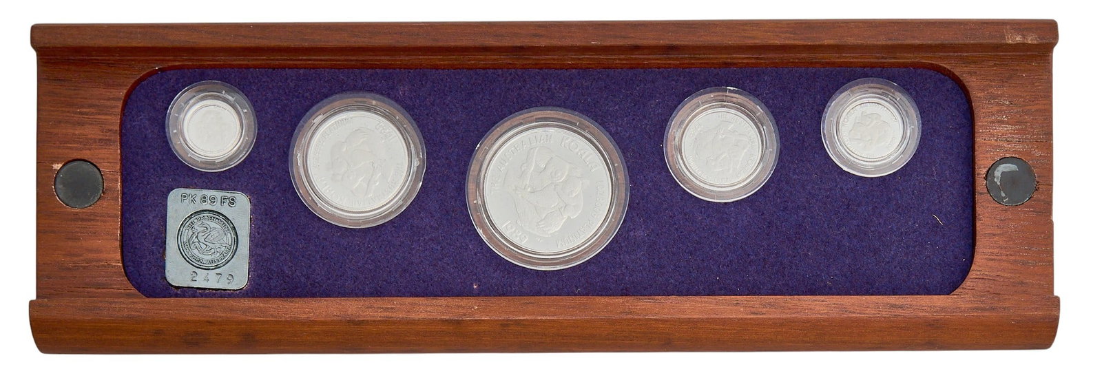 1989 Australian Koala Proof Platinum 5 Coin Set: 1989 Australian Koala Proof Platinum 5 Coin Set presented in a wooden display case with a purple velvet lining Provenance: Property from the Estate of Joy Speck Wilson (1942-2026) from her Menard,
