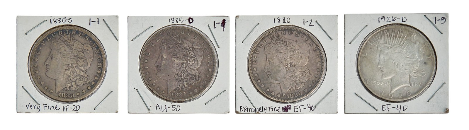 (4) American Silver Dollars: Collection of four American silver dollars, includes one Morgan dollar, and three Peace dollars Provenance: Property from a home in San Antonio, Texas