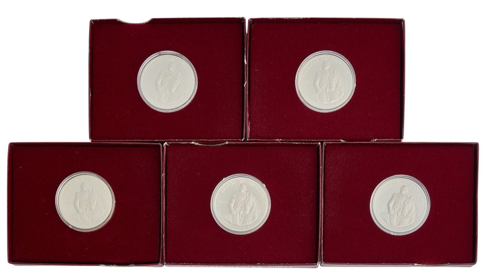 (5) 1982 George Washington Commemorative Half Dollar Silver Coins: Five 1982 George Washington Commemorative half dollar silver coins, each .3617 troy ounce .900 silver, slabbed and in original box Provenance: Property from a home in San Antonio, Texas