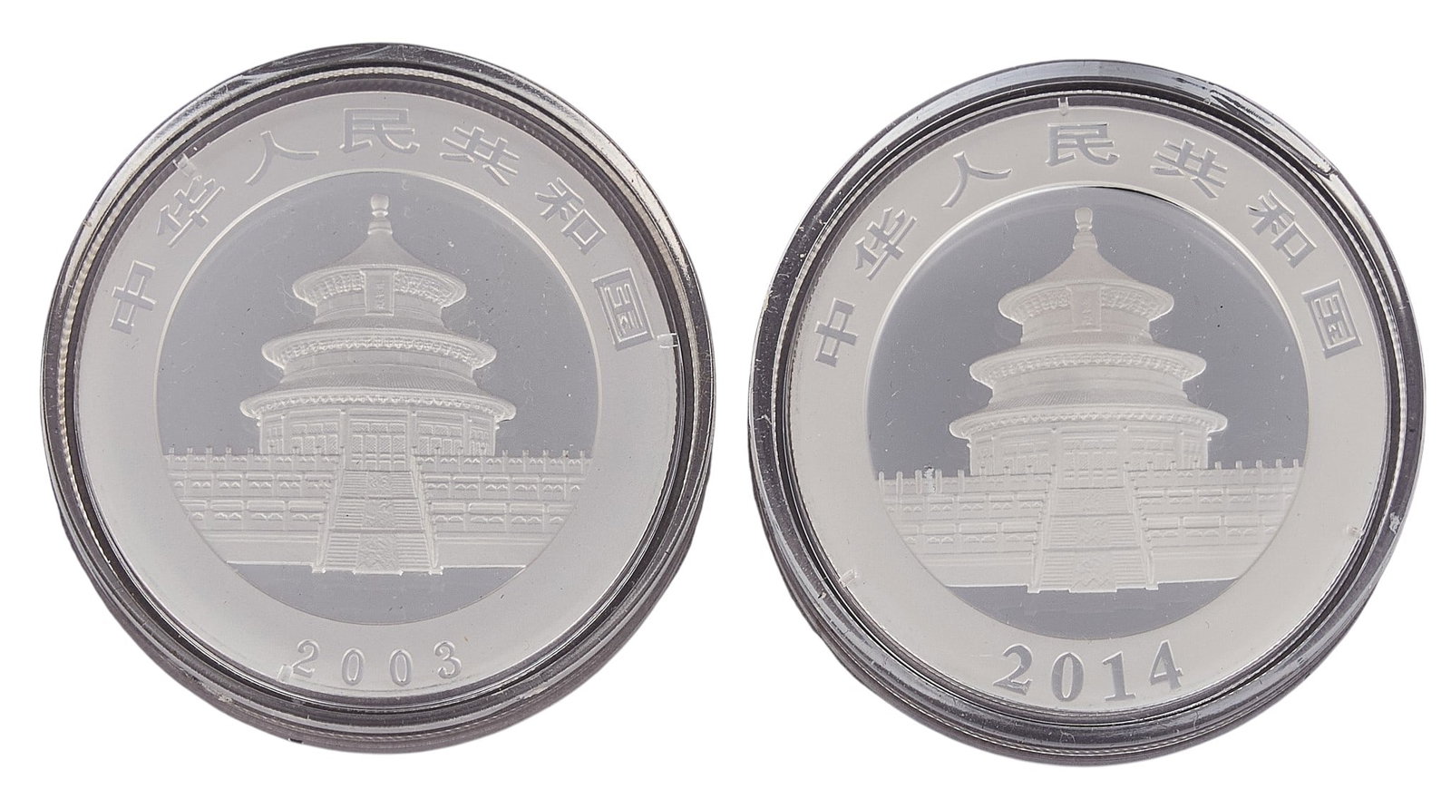 (2) Chinese Panda Silver Coins: Two Chinese panda silver coins, each one ounce .999 fine silver, slabbed Provenance: Property from a home in San Antonio, Texas