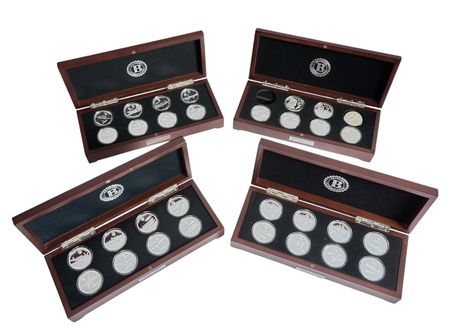 Collection of (4) Commemorative World War II Silver Coin Sets: Collection of four commemorative World War II silver coin sets, includes three World War II Fighters Collection sets, and one Heroes of Pearl Harbor set, all Bradford authenticated, and with original 
