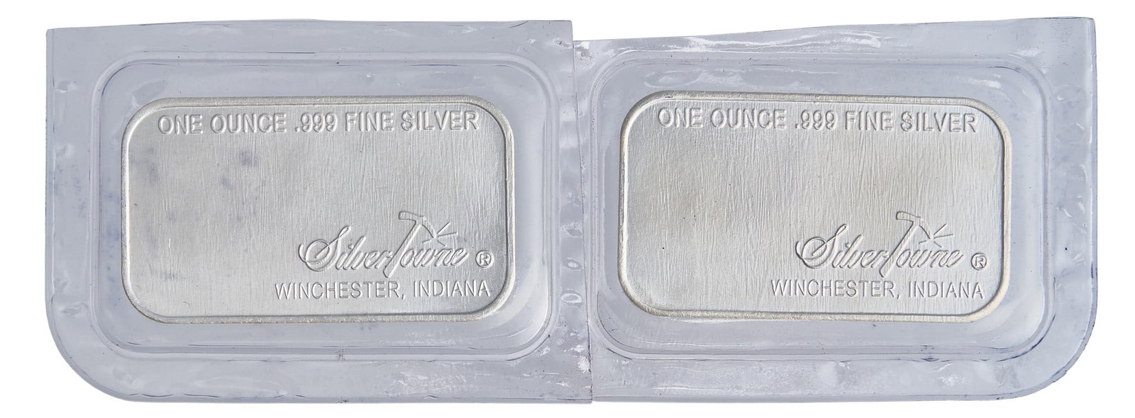 (2) 1 ozt. Fine Silver .999 Bars: Two one ounce fine silver .999 bars, produced by SilverTowne Provenance: Property from a home in San Antonio, Texas