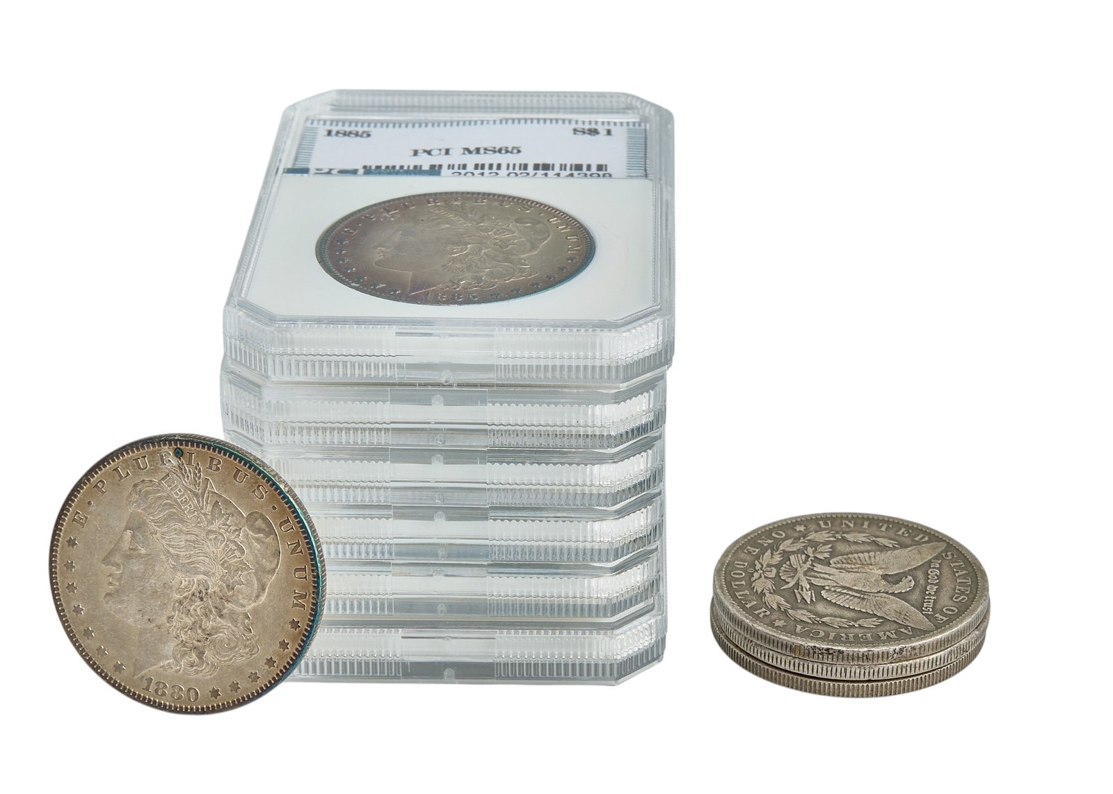 (10) Silver Coins: Collection of ten silver coins to include seven Morgan dollars, one Peace dollar, one Walking Liberty Half dollar, and one Susan B. Anthony dollar Provenance: Property from a home