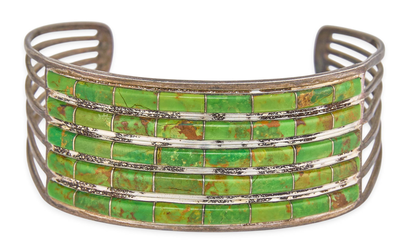 Zuni Sterling & Turquoise Cuff: Zuni sterling silver cuff bracelet set with five rows of turquoise inlay, marked "RD Sterling" Circumference: 6.5 in. Total weight: 21.2 g Provenance: Property from the personal collection o