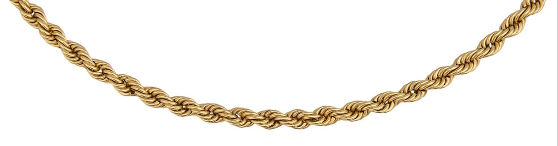 14K Rope Twist Necklace: 14K gold rope twist necklace, marked "14KP" Length: 20 in. Total weight: 10.56 g Provenance: Property from a home in the Alamo Heights neighborhood of San Antonio, Texas