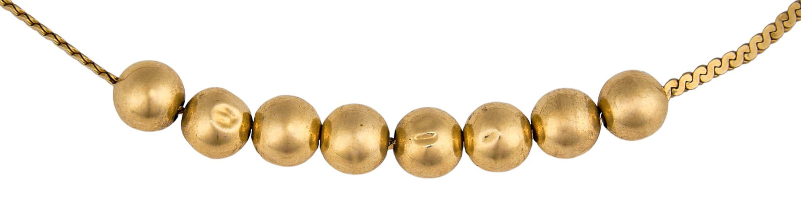 14K Beaded Necklace: 14K gold necklace featuring eight gold beads, clasp marked "ITALY 14K" Length: 16 in. Total weight: 3.6 g Provenance: Property from a home in the Alamo Heights neighborhood of San
