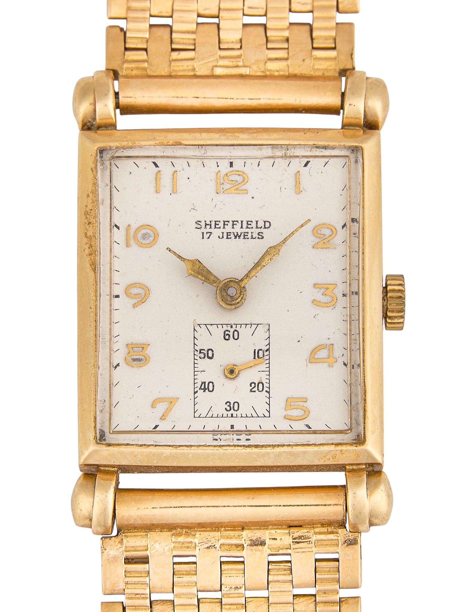 18K Sheffield 17-Jewel Watch: Vintage Sheffield 17-jewel mechanical wristwatch with a rectangular case, a white dial featuring gold numerals, and a sub-seconds dial at the 6 o'clock position, case marked "14 KARAT