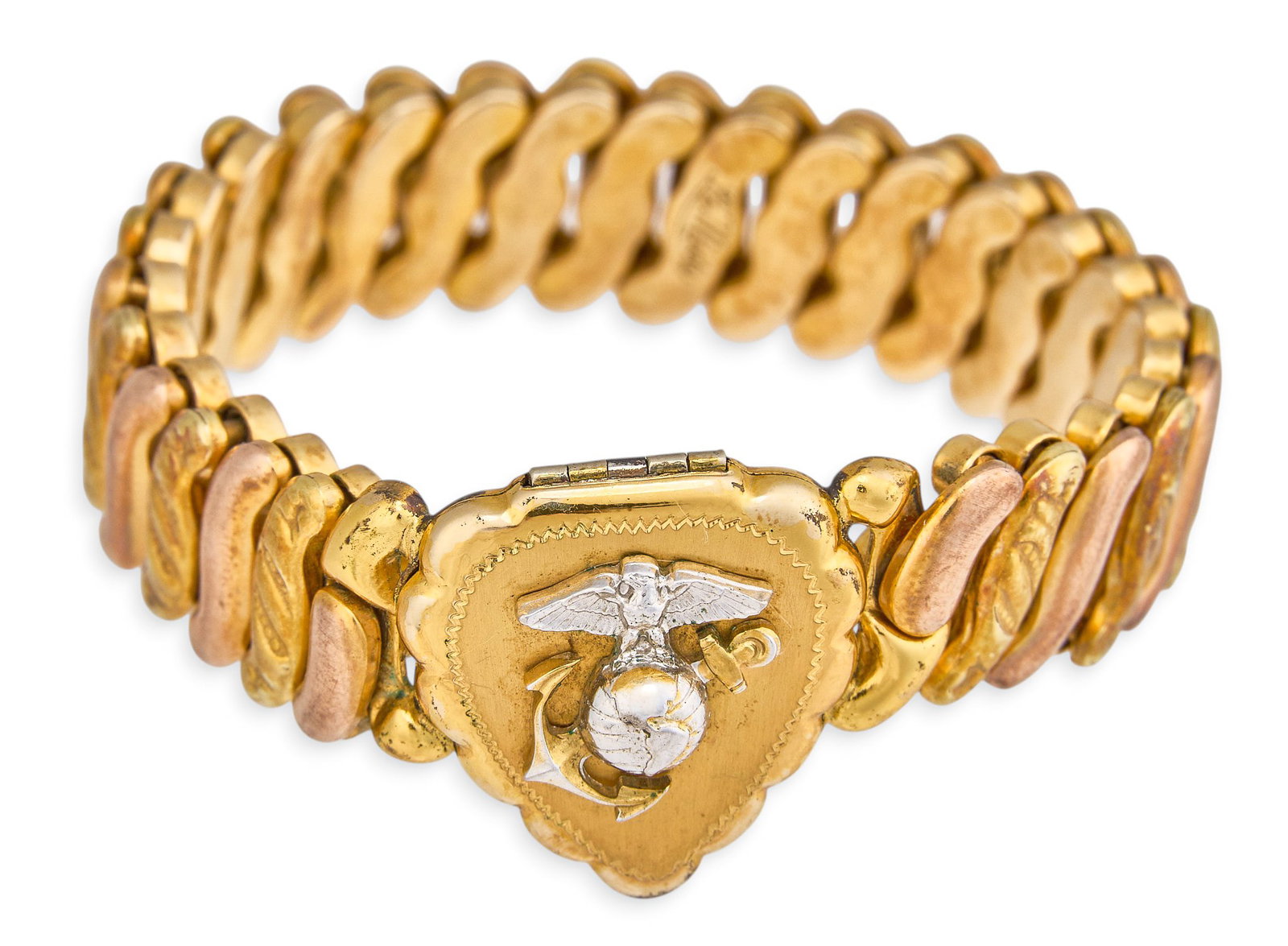 WWII US Marine Corp Locket Bracelet: World War II-era style gold-filled military sweetheart expansion bracelet, featuring a heart shaped locket with a U.S. Marine Corps insignia, marked La Mode Total weight: 22.2 g Provenance: Property f