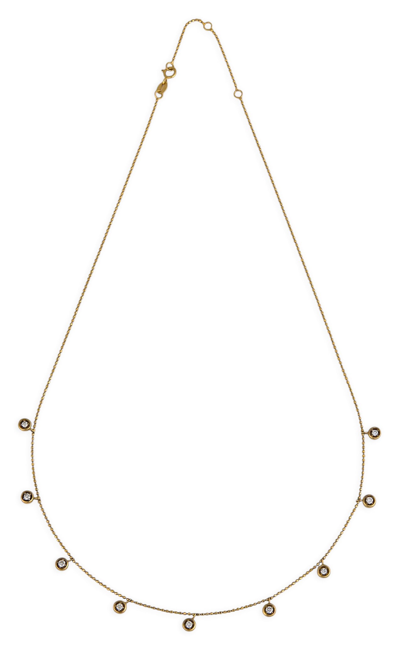 10K Diamond Station Necklace: 10K gold station necklace set with round-cut diamonds, approximately 0.5 ctw, marked "10K" to clasp Length: 18 in. Total weight: 2.7 g Provenance: Property from a home in San Antonio, Texas