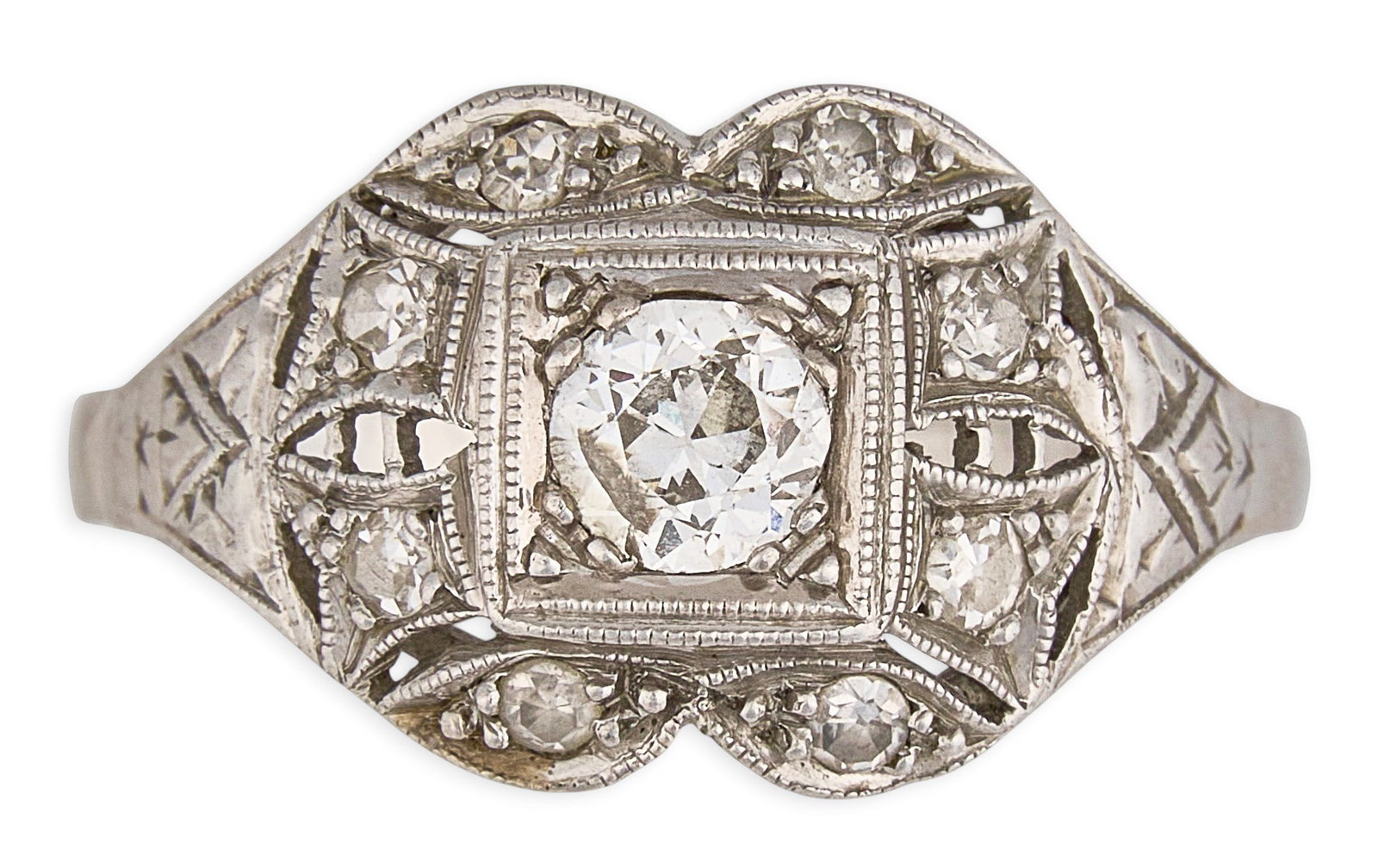 14K Diamond Filigree Ring: 14K white gold (tested) ring set with round cut diamonds, filagree work throughout Size: 6.75 Total weight: 3.97 g Provenance: Property from a home in the Alamo Heights neighborhood of San