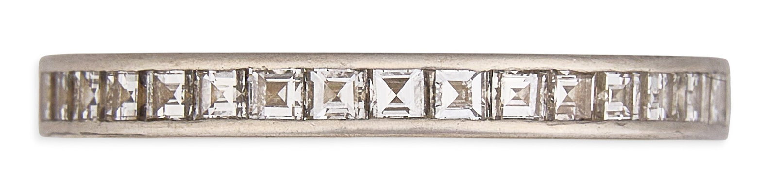 18K Eternity Diamond Ring: 18K white gold (tested) eternity ring set with a single row of square-cut diamonds Size: 5.75 Total weight: 2.63 g Provenance: Property from a home in the Alamo Heights neighborhood of San