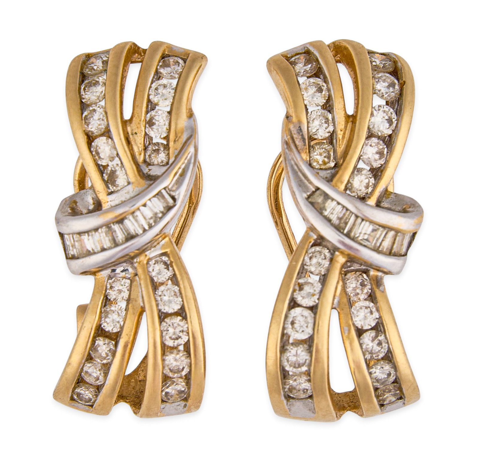 14K Two-Tone Diamond Earrings: Pair of 14K two-tone gold earrings, set with round and baguette-cut diamonds, marked "14K" Size: 7/8 in. / length Total weight: 5.8 g Provenance: Property from the personal collection
