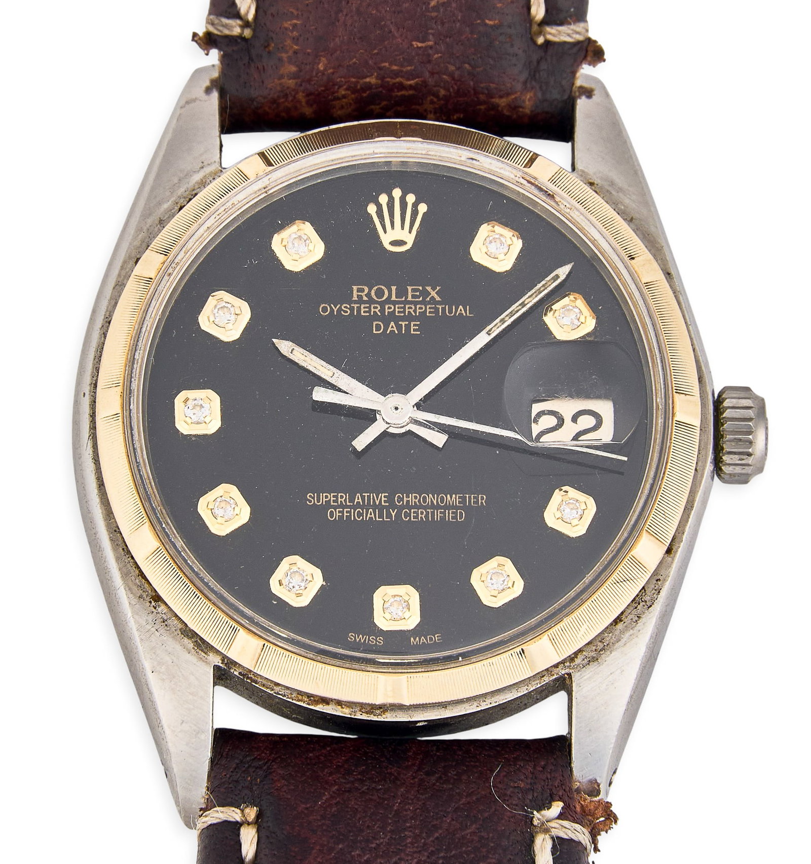 Vintage Rolex Oyster Perpetual Date Watch: Vintage Rolex Oyster Perpetual Date watch featuring a dark dial with diamond hour markers and a date complication, two-tone stainless steel bezel with a brown leather strap, circa 1960s Total weight: