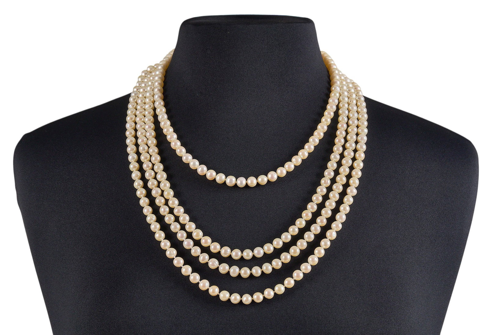 96 In. Strand of Pearls: Long single-strand of pearls, composed of three hundred twenty-five pearls, approximately 8 mm Length: 96 in. Total weight: 178.6 g Provenance: Property from a home in San Antonio, Texas