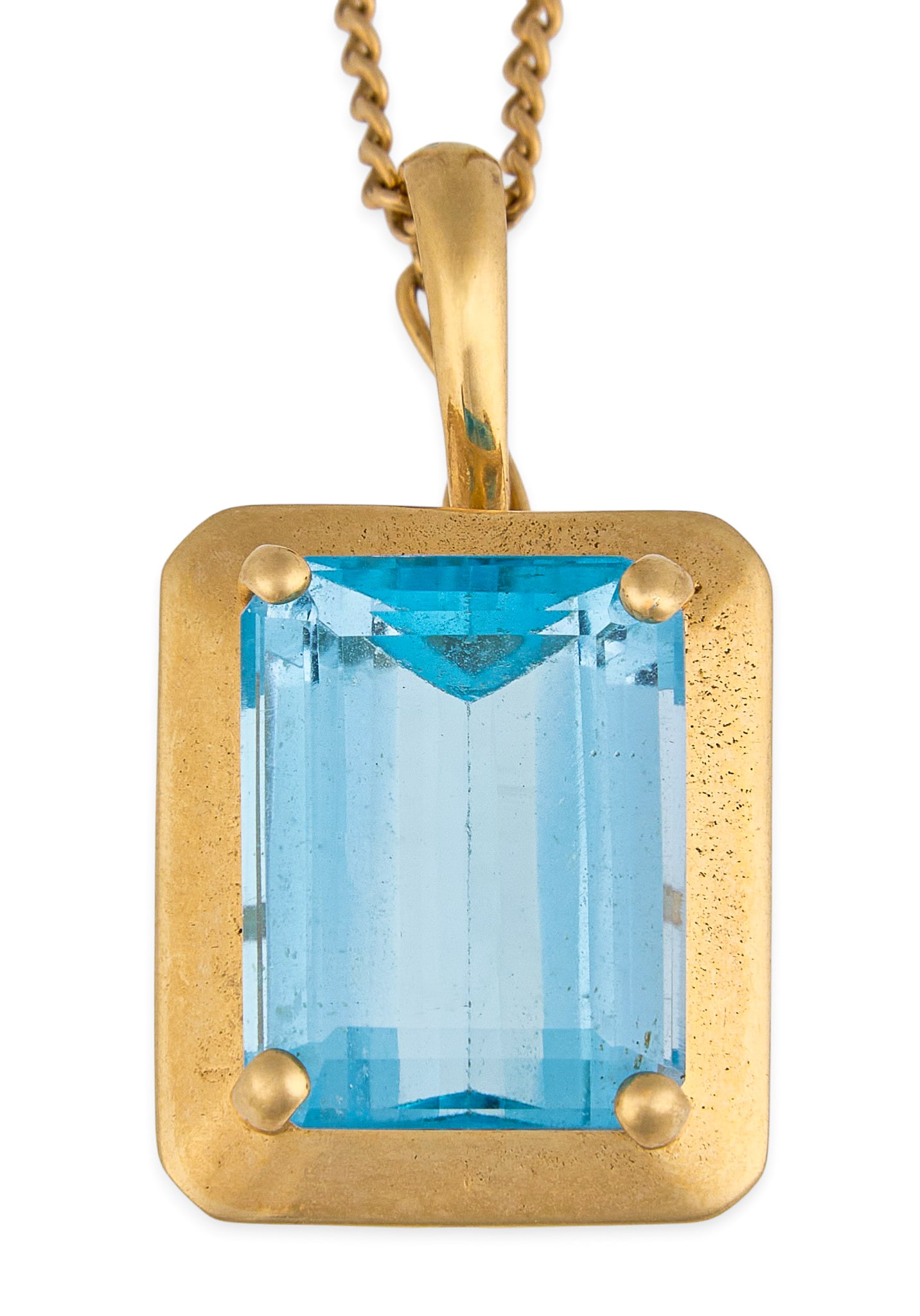 14K Aquamarine Pendant Necklace: 14K gold pendant necklace set with emerald-cut blue topaz, marked "14K 585" Length: 22 in. Total weight: 8.72 g Provenance: Property from a home in the Alamo Heights neighborhood of San