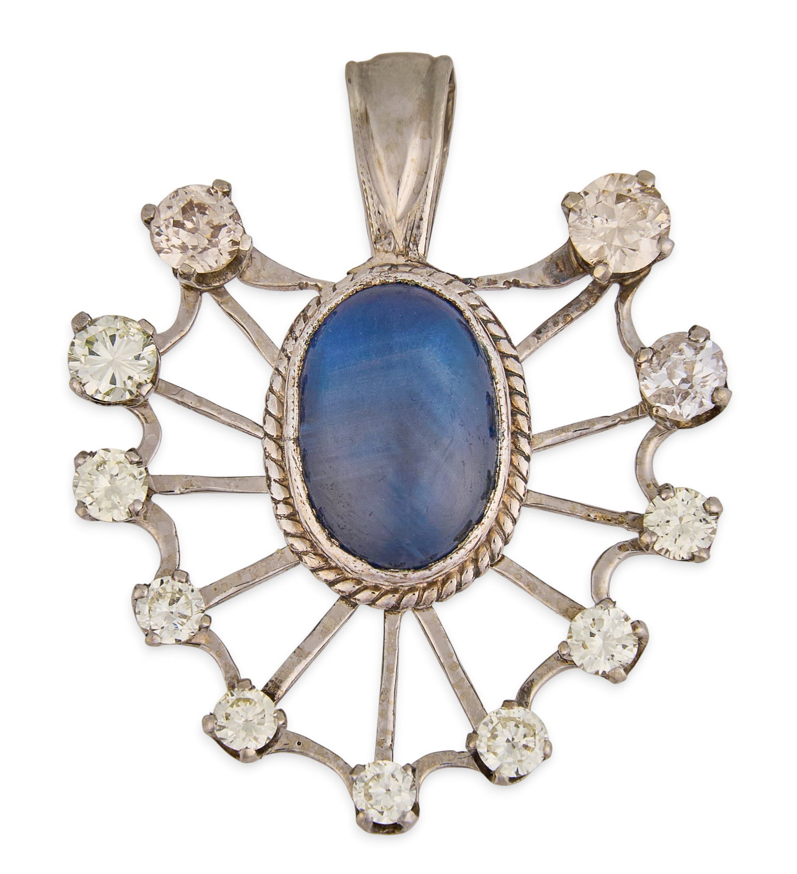14K Blue Star Sapphire & Diamond Pendant: 14K white gold pendant, set with oval shaped blue star sapphire cabochon, surrounded by eleven round cut diamonds in graduated design, marked "14K" Size: 7/8 in. x 1 1/8 in. Total weight: