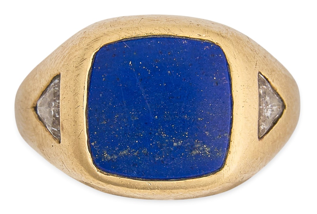 14K Lapis Ring: 14K gold ring set with blue lapis inlay, flanked by diamond details, marked "14K" Size: 7 Total weight: 7.4 g Pr